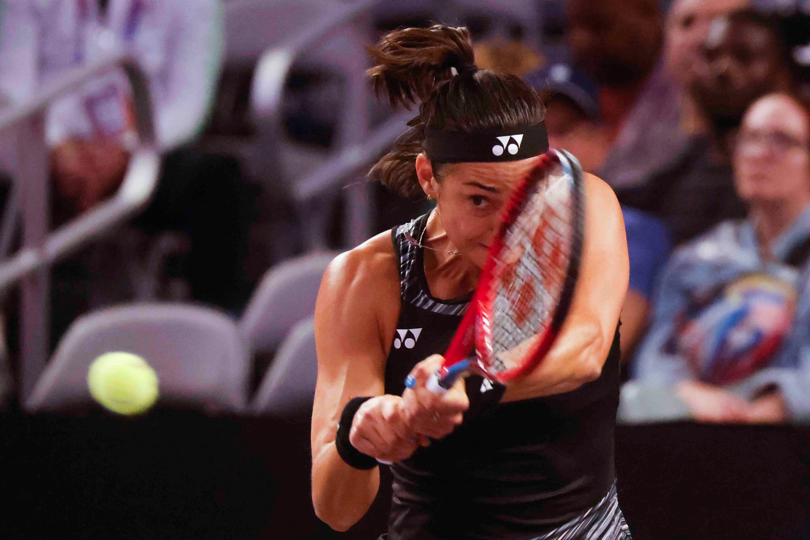 Caroline Garcia of France returns a shot against Coco Gauff of the USA on day two of the WTA...