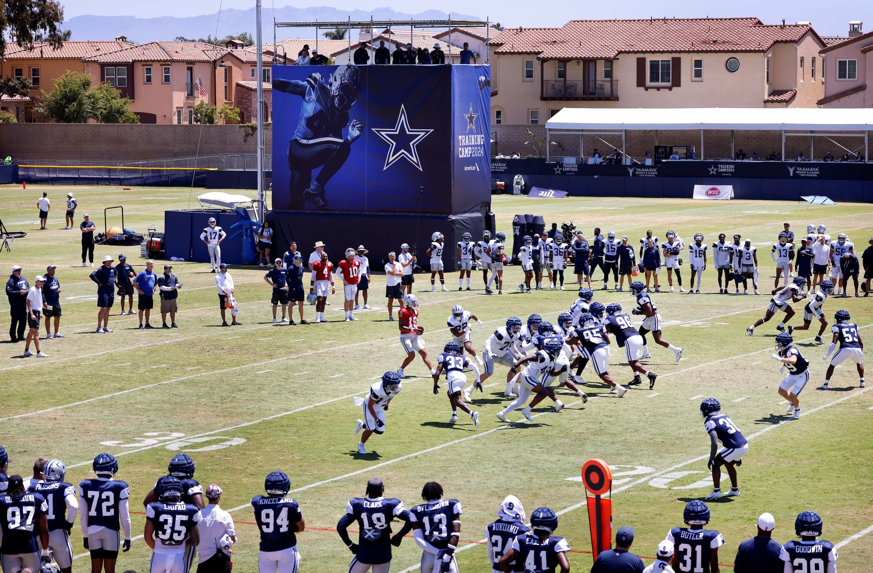 Dallas Cowboys quarterback Trey Lance (19) drops back to pass as the offense faces the...