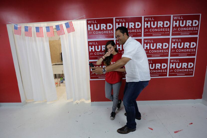 Freshman Republican Rep. Will Hurd posed for a photo with a supporter in August at his...