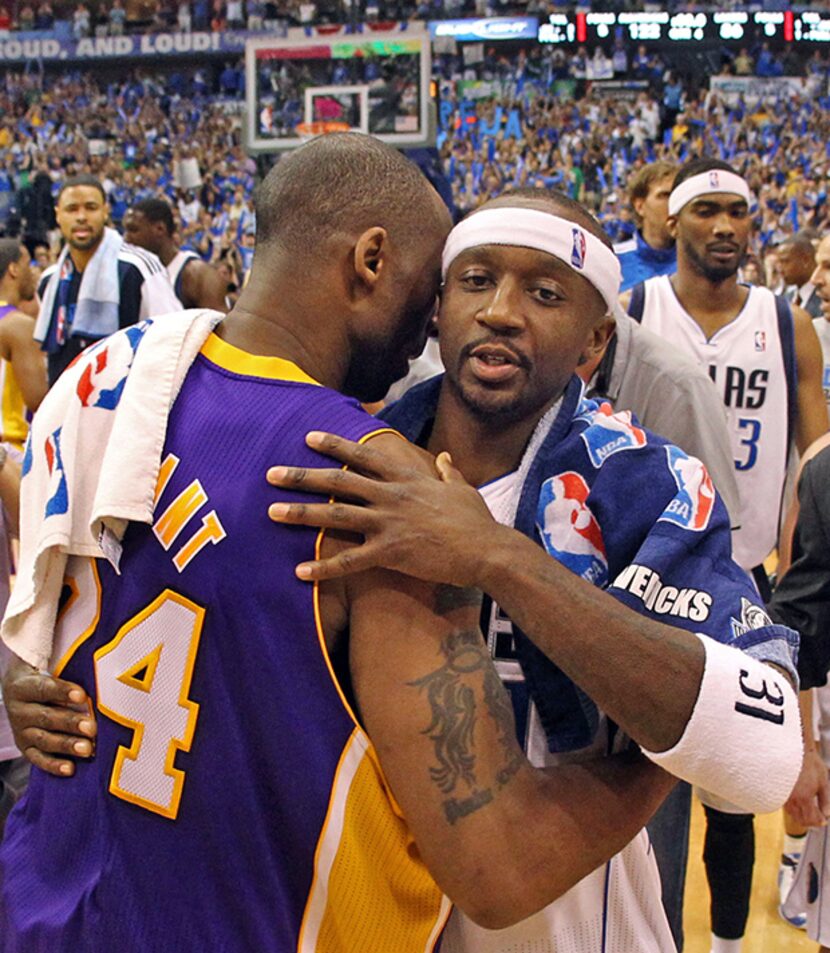  May 8, 2011--Dallas' Jason Terry gets a hug from Los Angeles' Kobe Bryant after the final...