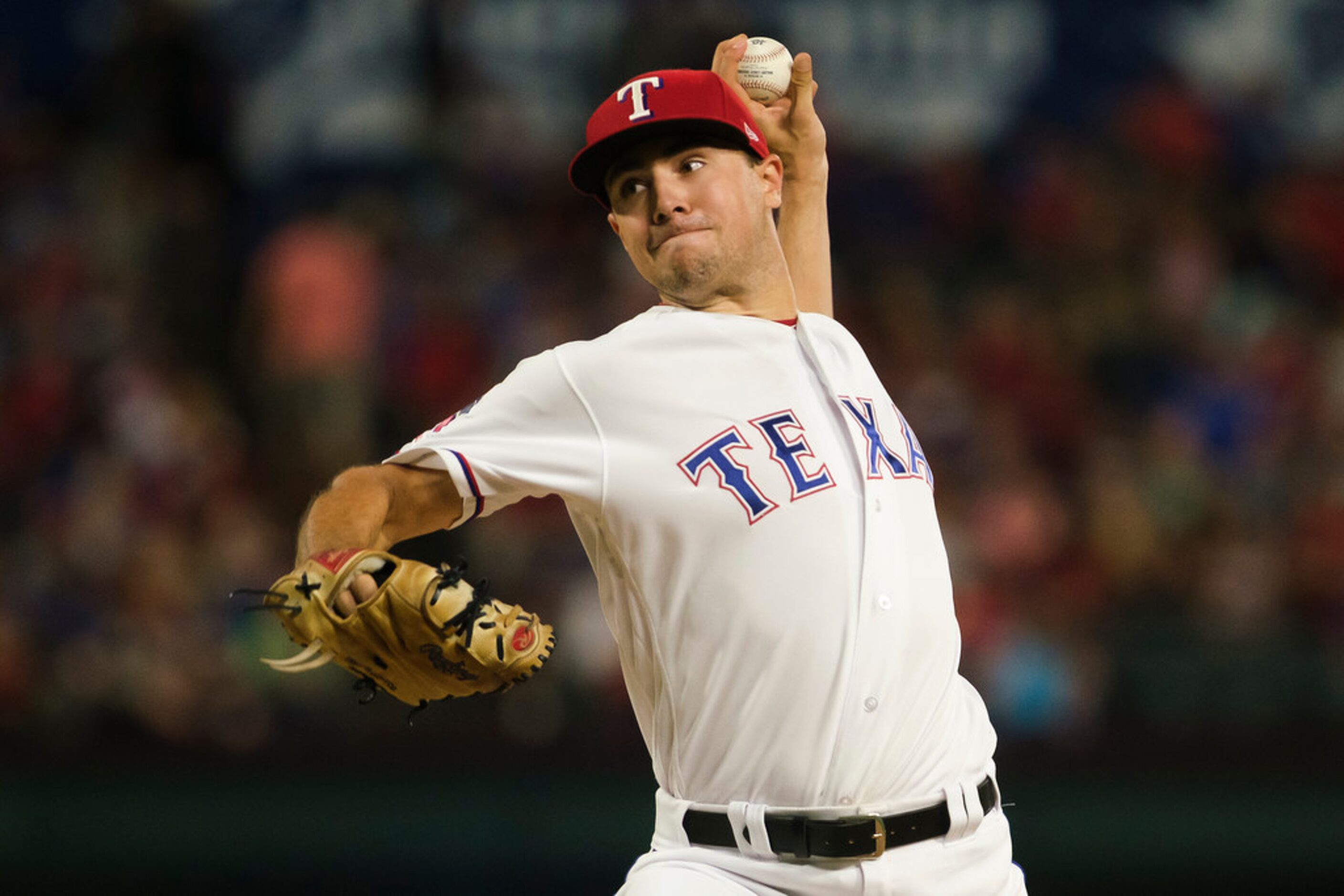 Texas Rangers starting pitcher Brock Burke pitches during the fifth inning against the...