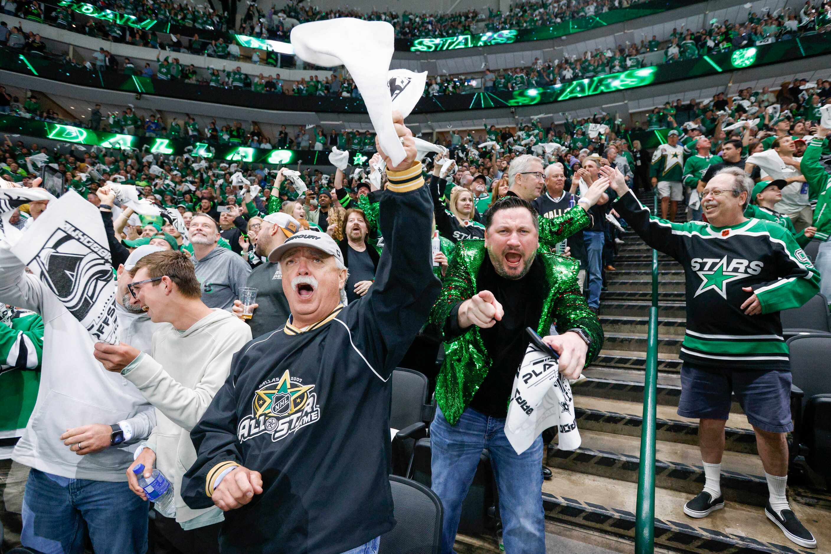 Dallas Stars fans celebrate after a goal by center Joe Pavelski (16) during the first period...