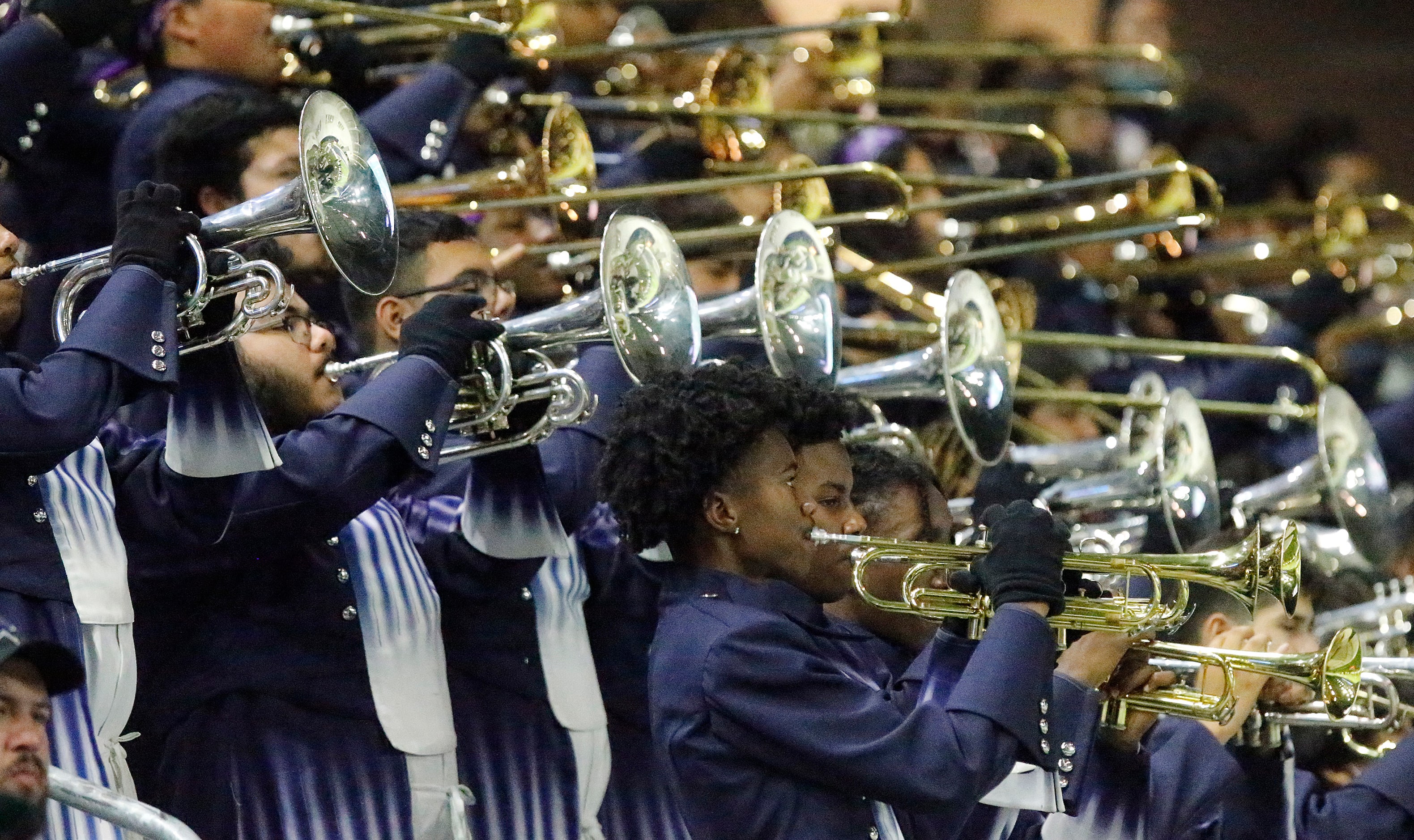 The Duncanville High School marching band plays during the first half as DeSoto High School...