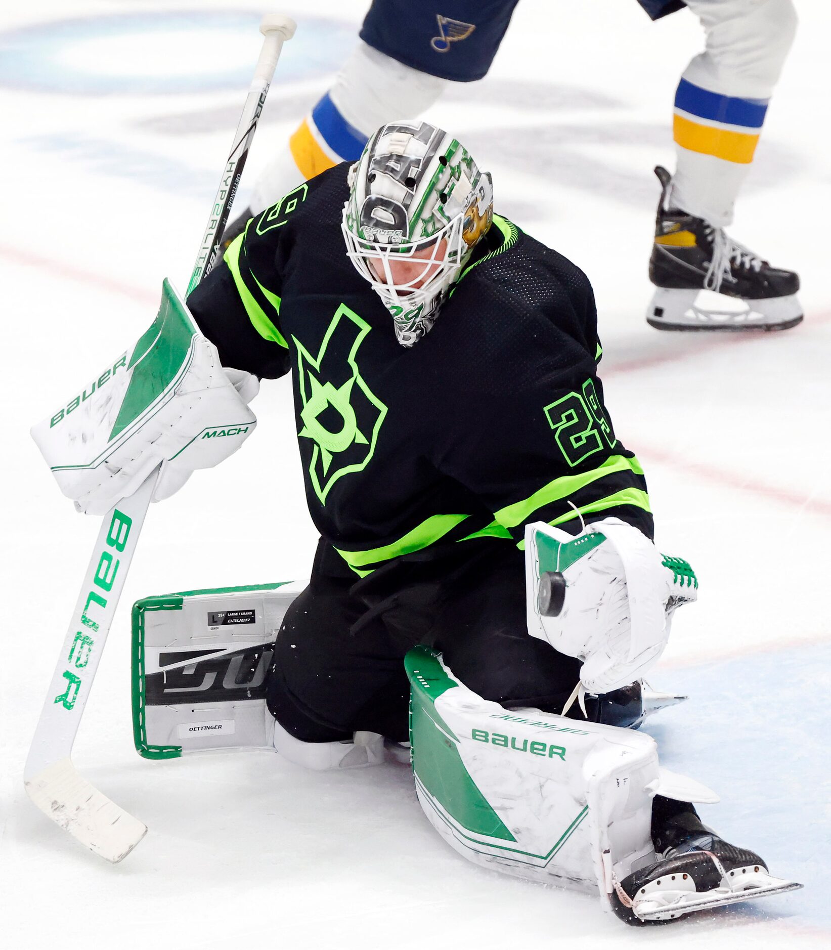 Dallas Stars goaltender Jake Oettinger (29) blocks a St. Louis Blues shot during the third...