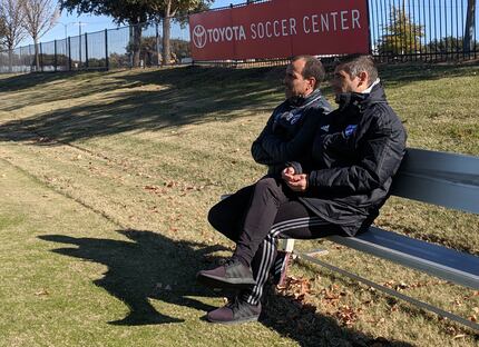 Oscar Pareja (left) and Luchi Gonzalez (right) watch FC Dallas train. (11/15/18)