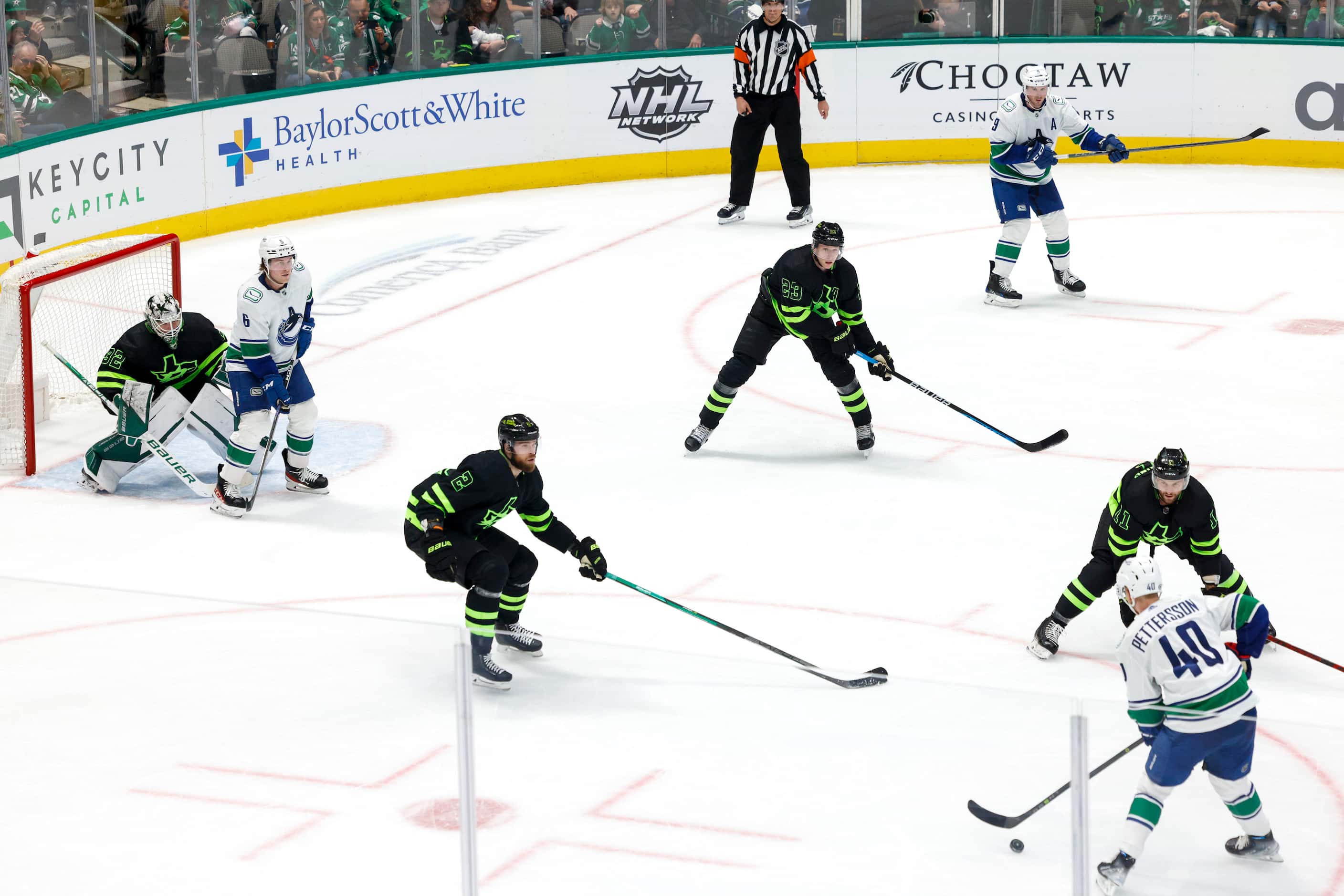 Vancouver Canucks center Elias Pettersson (40) handles the puck during a power play in the...