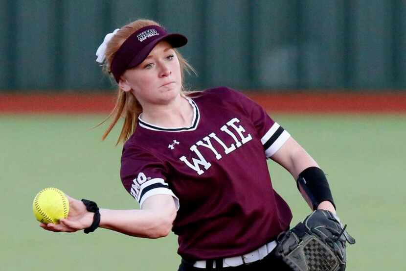 Wylie High School second baseman Mikayla Hoffman (6) throws for an out in the first inning...