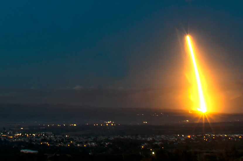 A SpaceX Falcon 9 rocket lifts off Thursday, Feb. 22, 2018, over Lompoc, Calif., from...