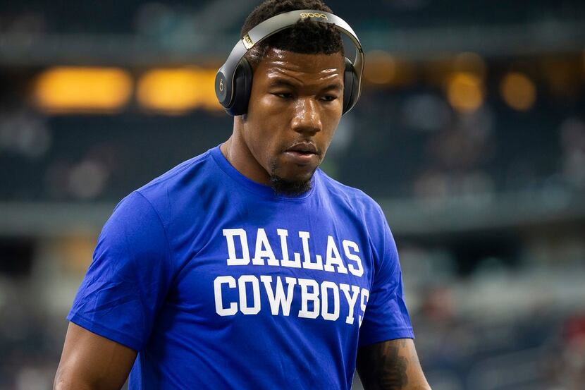Dallas Cowboys wide receiver Terrance Williams walks off the field after warming up before a...