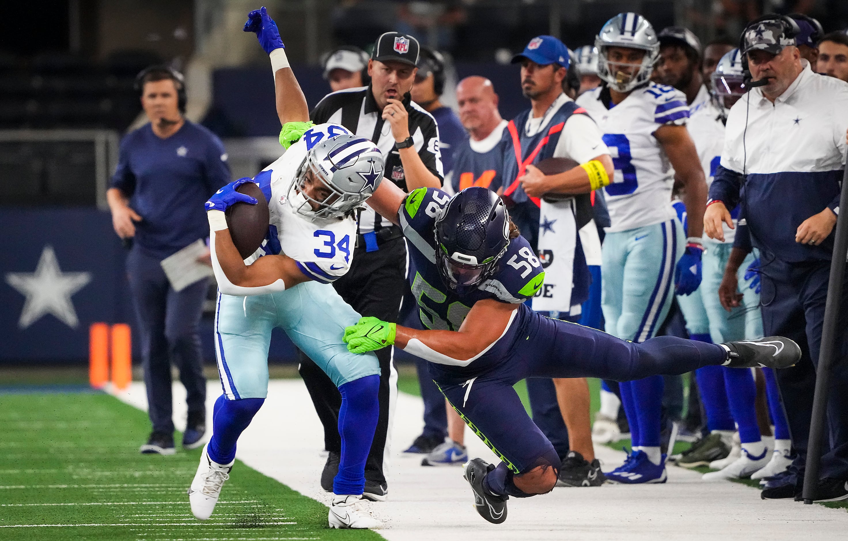 Cowboys-Seahawks photos: Peyton Hendershot gets helmet knocked off, players  rile up fans and more