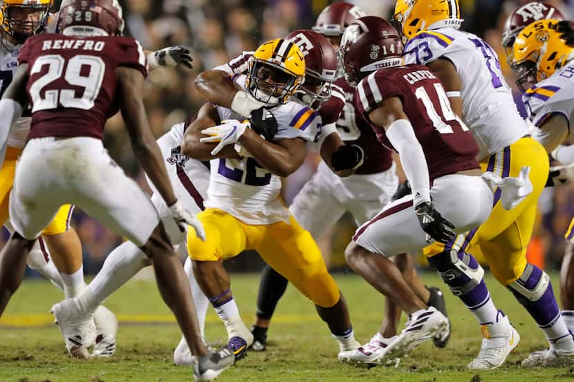 LSU running back Clyde Edwards-Helaire (22) carries during the first half of the team's NCAA...