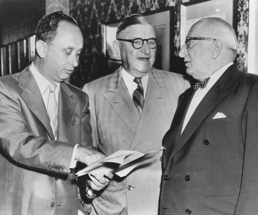 Alfred Hart (from left), president of the Del Mar Turf Club, announces the sale of...
