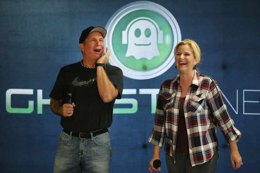 Garth Brooks and Trisha Yearwood laugh with the media at American Airlines Center in Dallas...