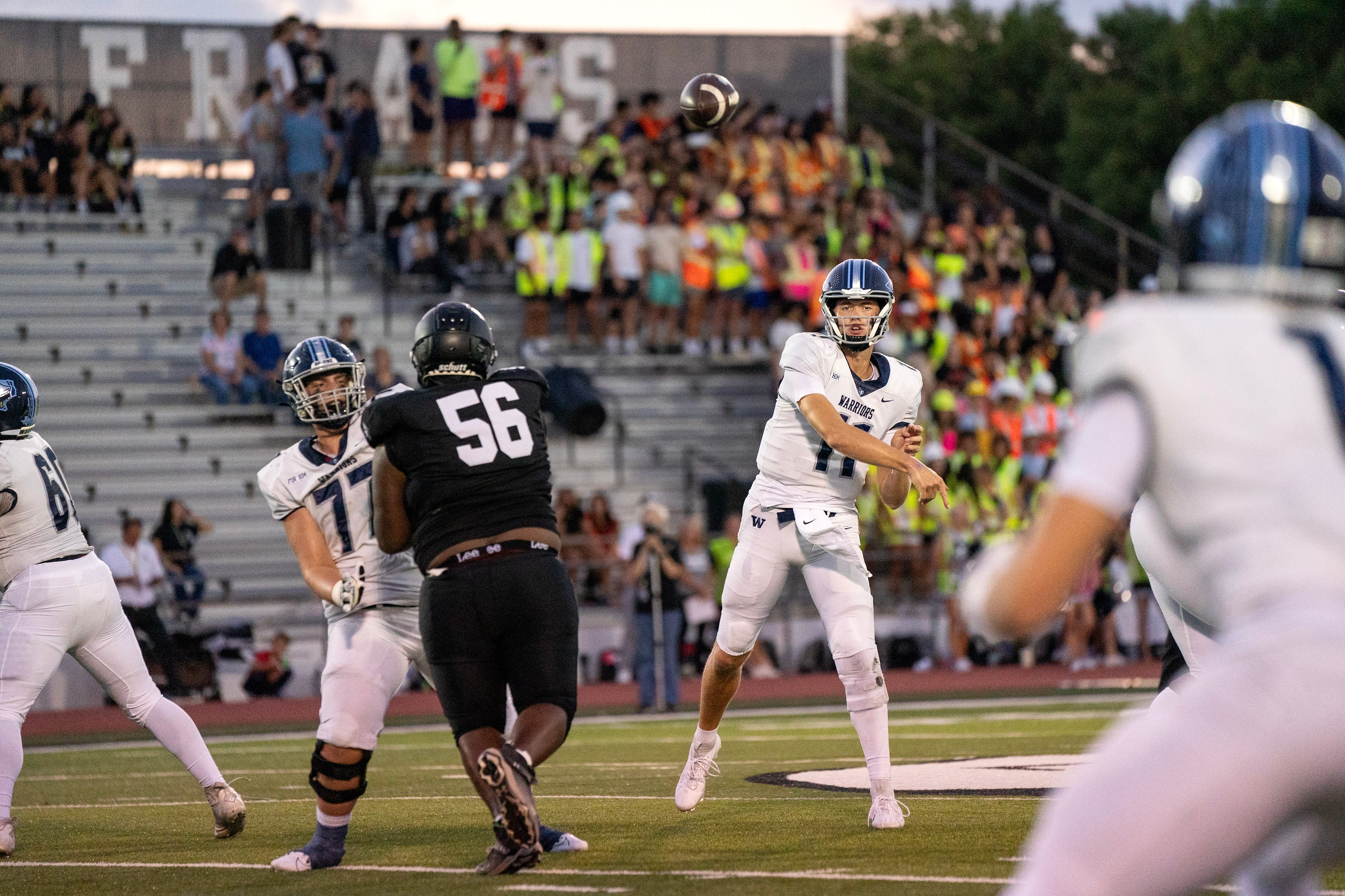 Argyle Liberty Christian senior quarterback Cole Welliver (11) throws a pass as junior...