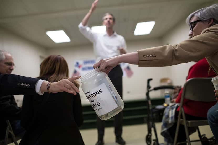 U.S. Rep. Beto O'Rourke, D-El Paso, speaks while a donations jar is passed around the...