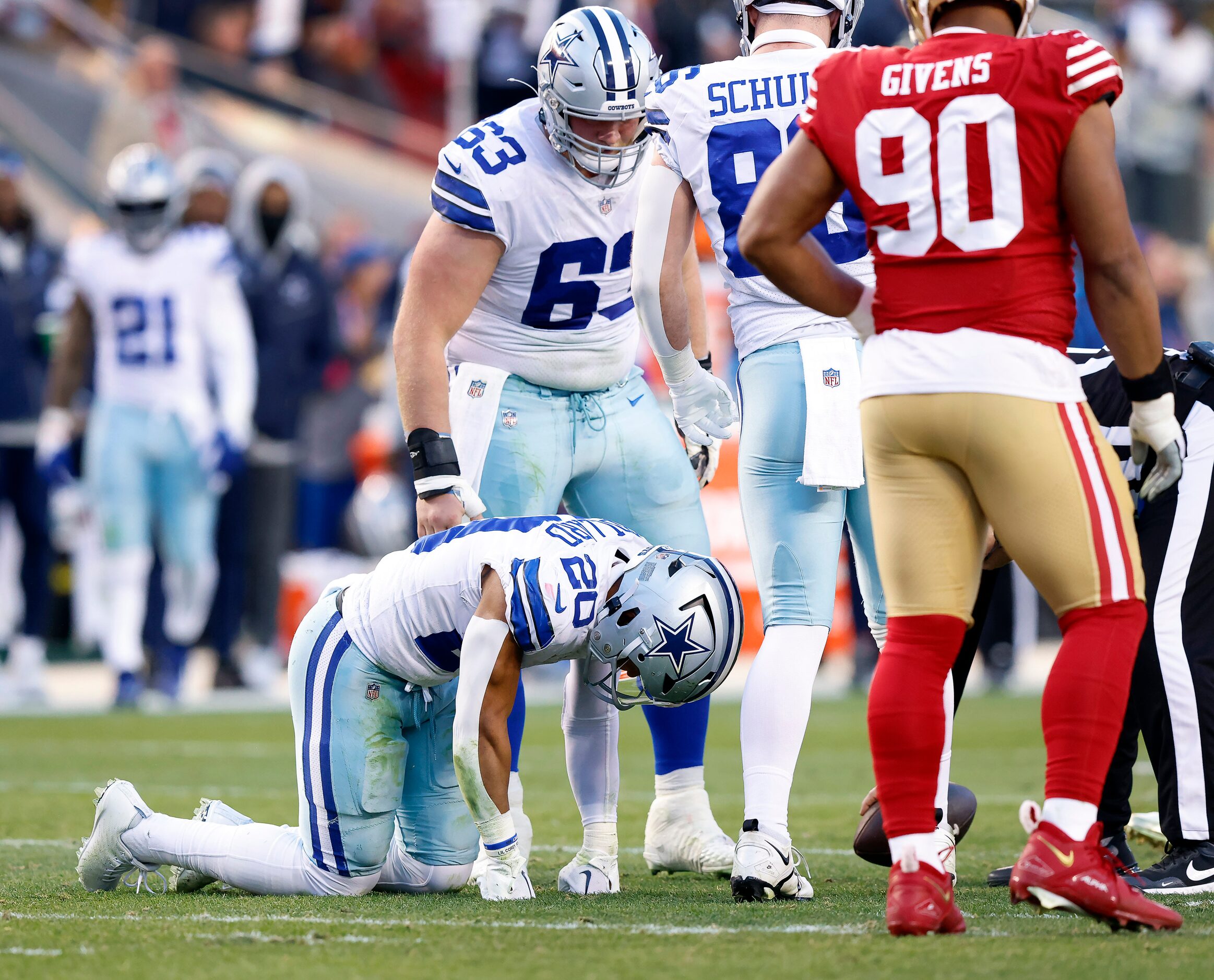 Dallas Cowboys running back Tony Pollard (20) is slow to get up in the second quarter after...