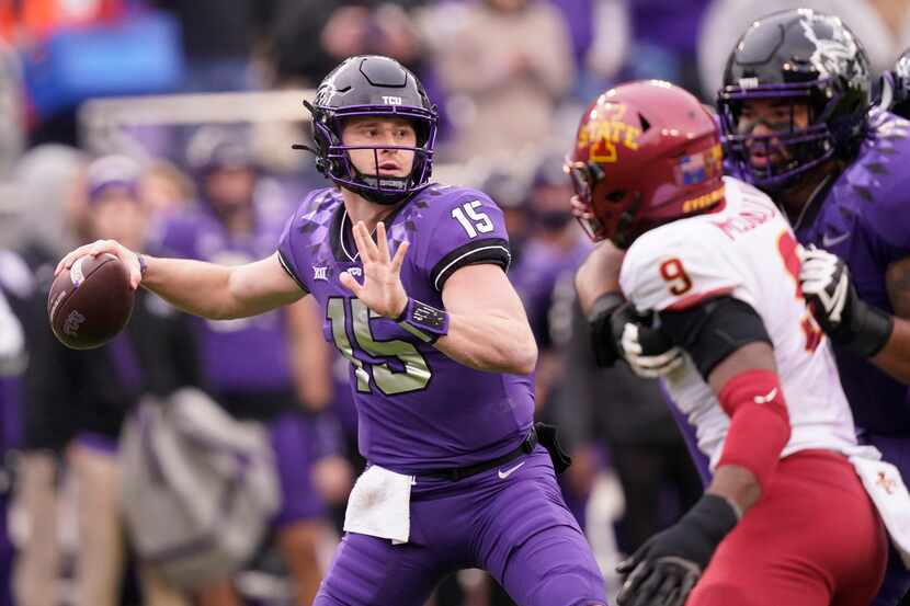 FILE - TCU quarterback Max Duggan (15) passes with blocking from teammate offensive tackle...