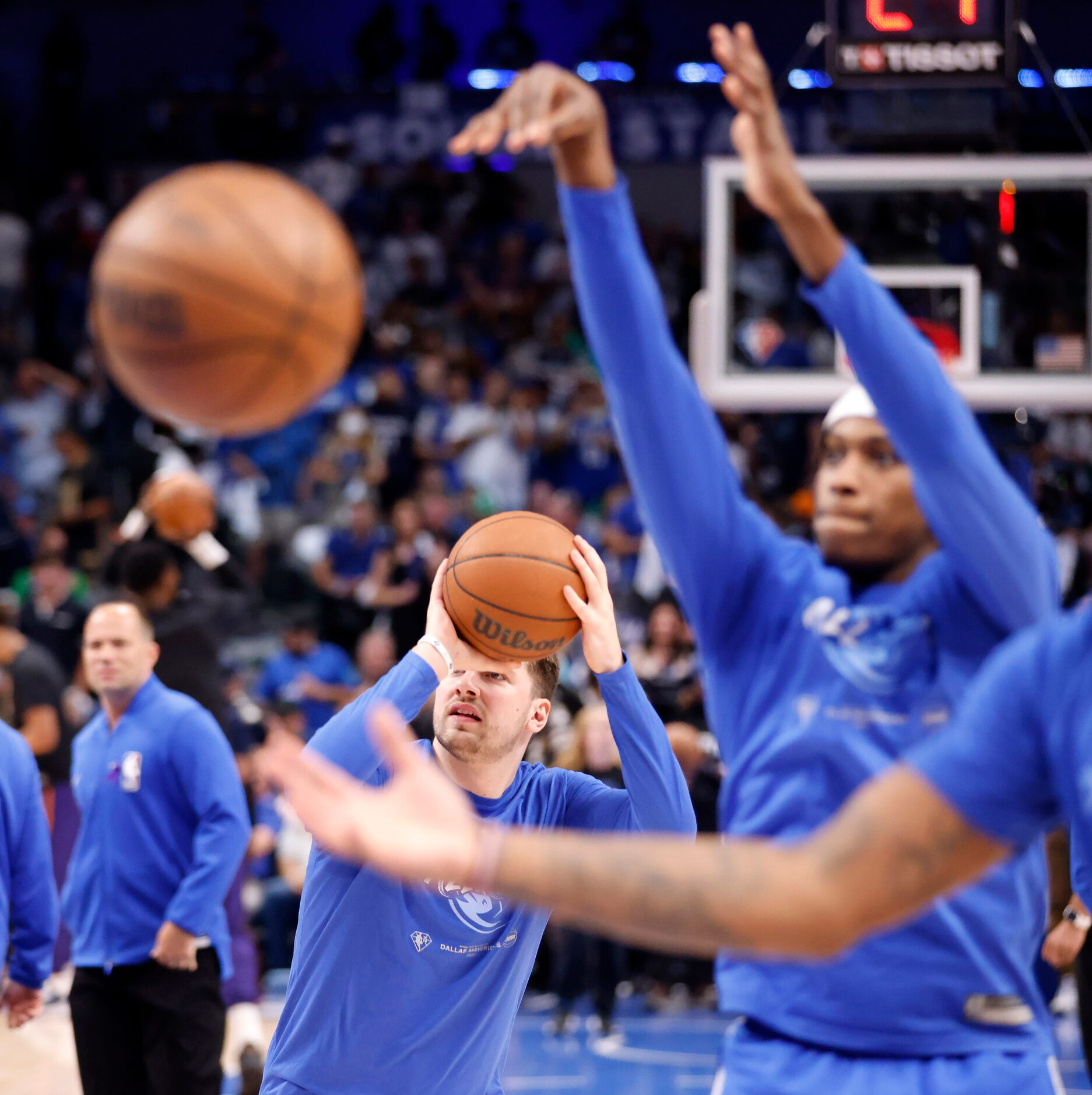 Dallas Mavericks guard Luka Doncic (77) warns up on the court before facing the Phoenix Suns...