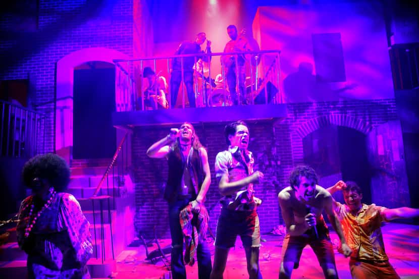 The cast of 'Hit the Wall,' performs a scene at the WaterTower Theatre in Addison, Thursday,...