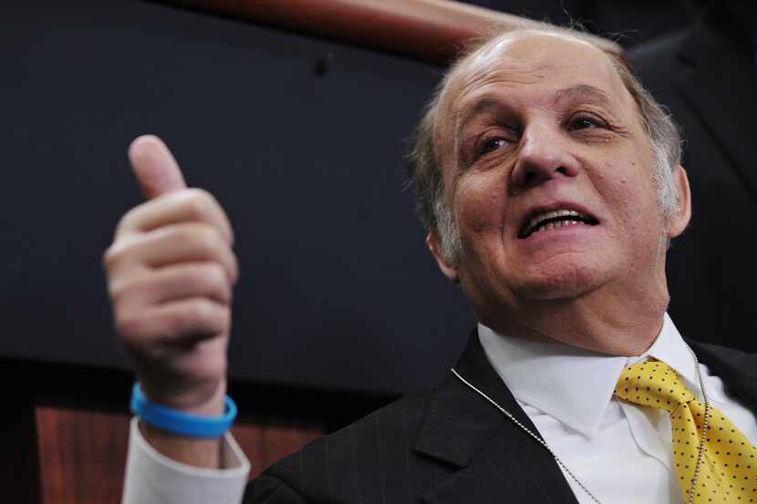 Former White House press secretary James Brady gives a thumbs-up while visiting the Brady...