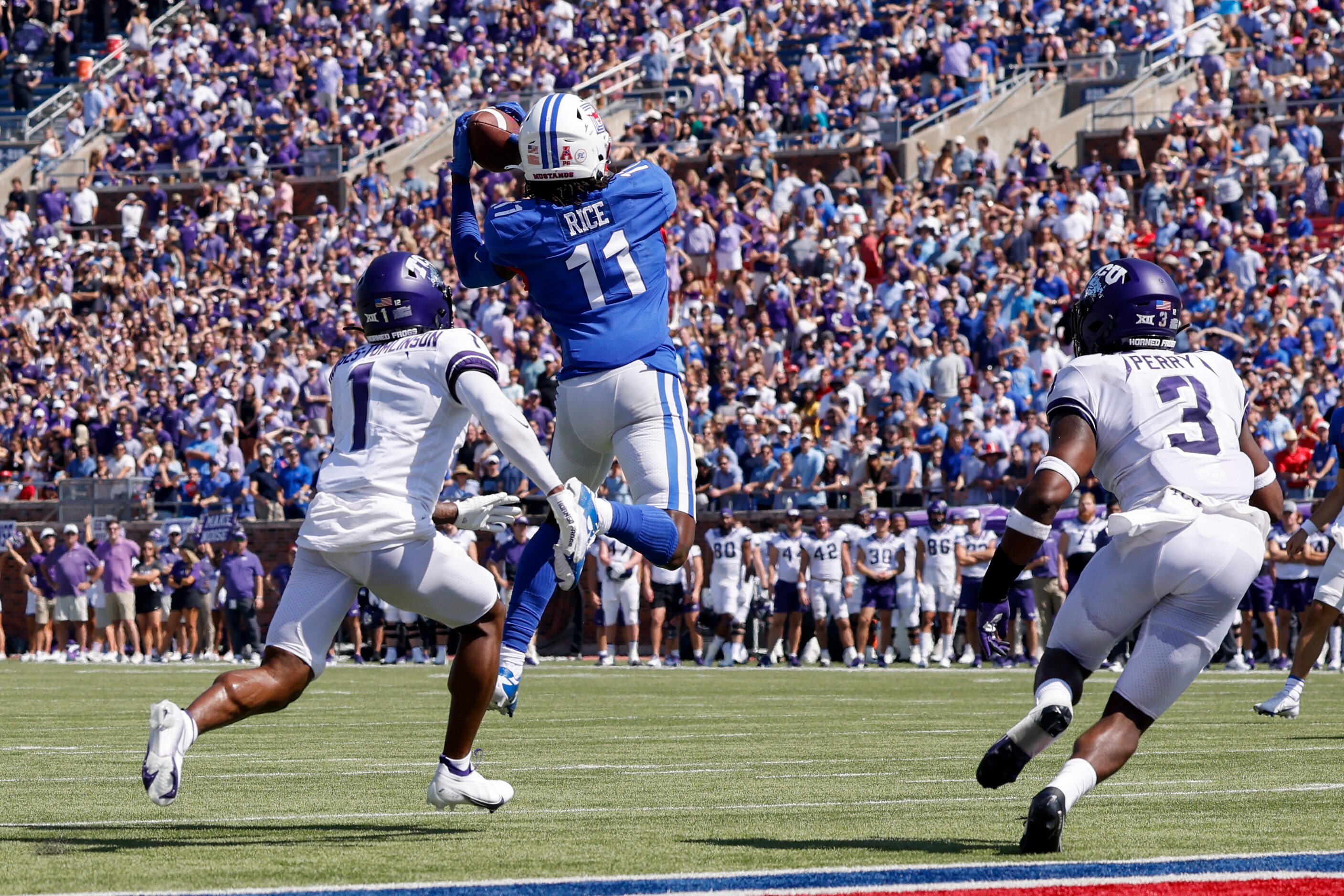 SMU wide receiver Rashee Rice (11) catches a pass inside the 5-yard line ahead of TCU...