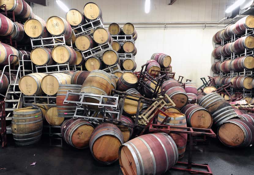 Barrels are strewn about inside the storage room of Bouchaine Vineyards in Napa in downtown...