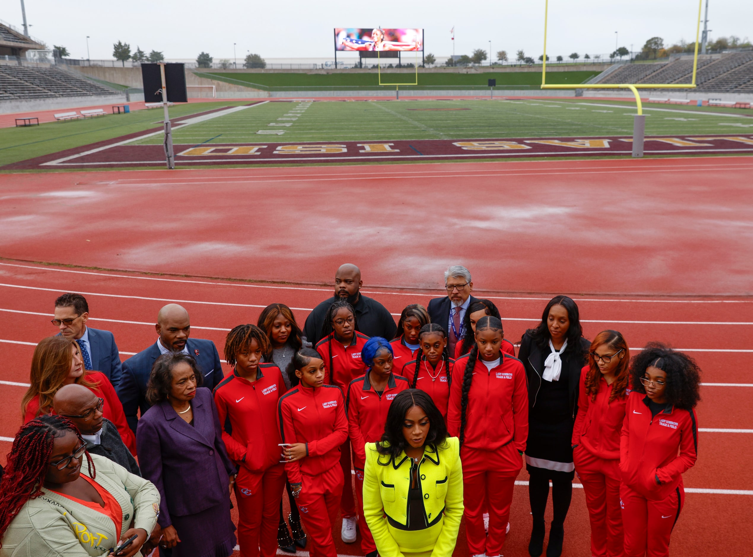 100 meters world champion Sha'Carri Richardson, (center) a former Carter star, alongside...