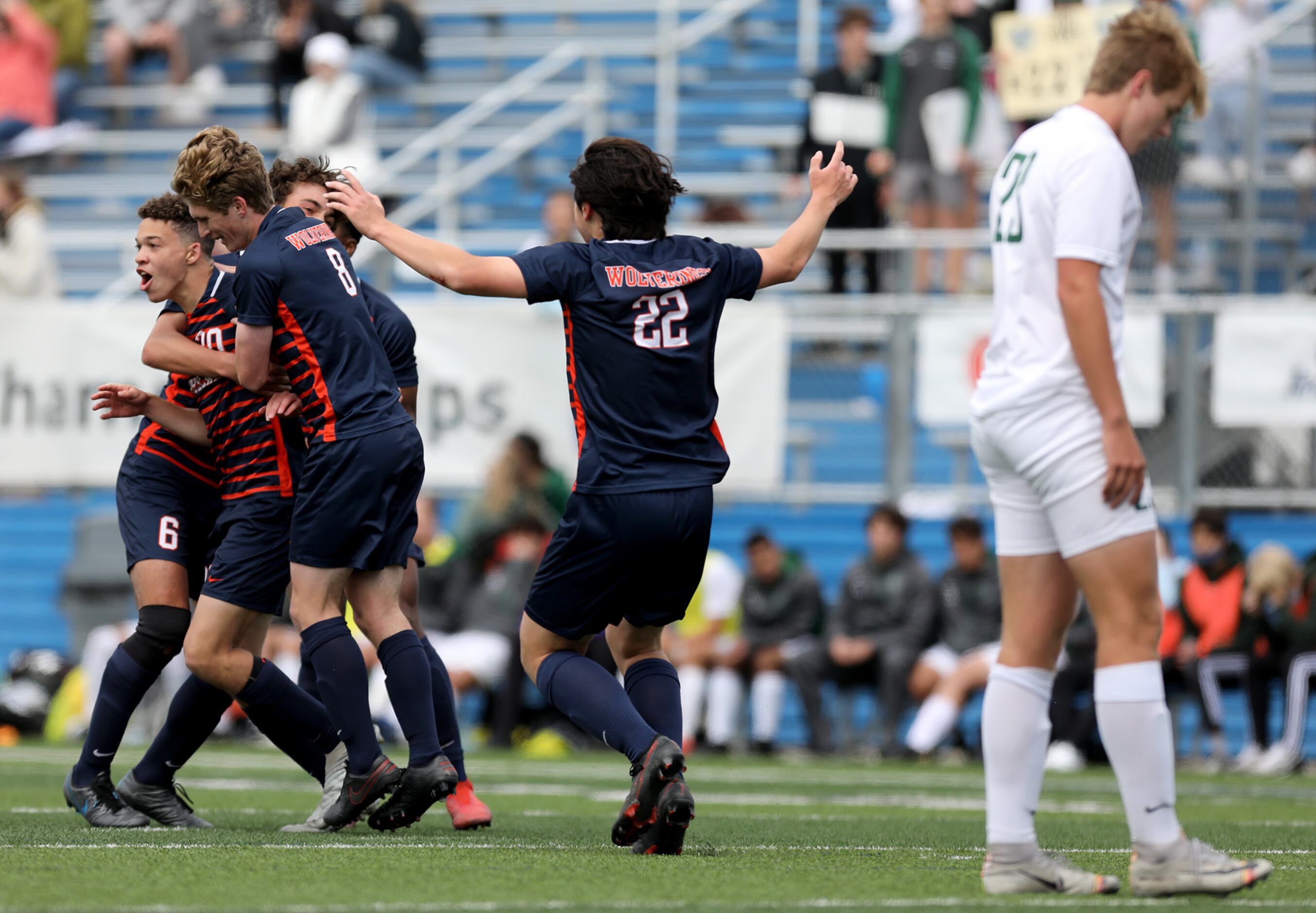 Frisco Wakeland's Micah Kelley (20) celebrates with teammates after scoring a goal against...