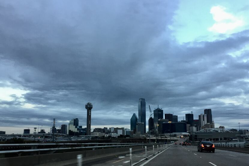 Dark clouds loom over downtown Dallas as a cold front moves in.