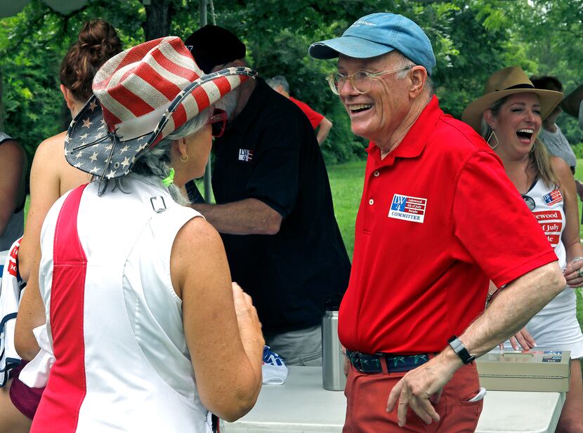 Millie Winston (left) and Al See, members of the Lakewood Parade Committee, talk after the...