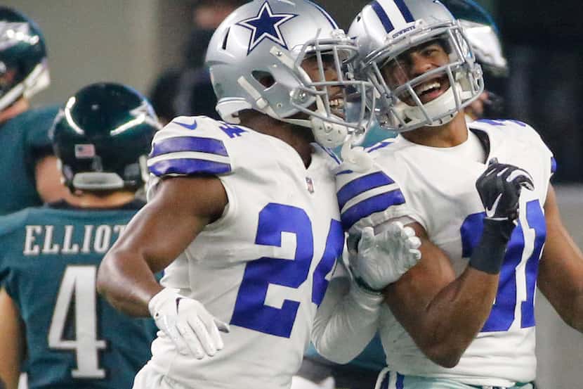 Dallas Cowboys Chidobe Awuzie (24) and  Byron Jones (31) are all smiles after a missed extra...