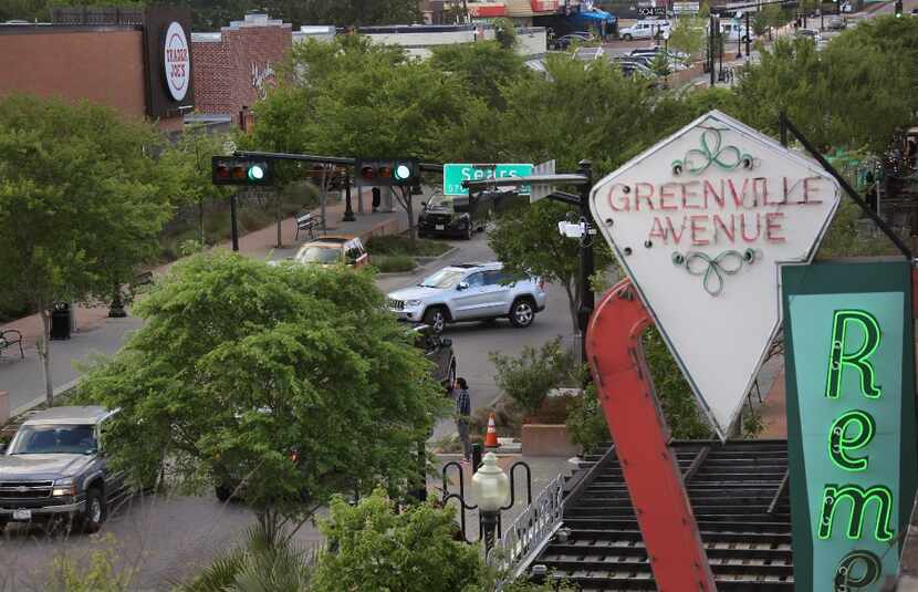 The traffic and parking scene on Lowest Greenville from the deck at HG Sply Co. on...