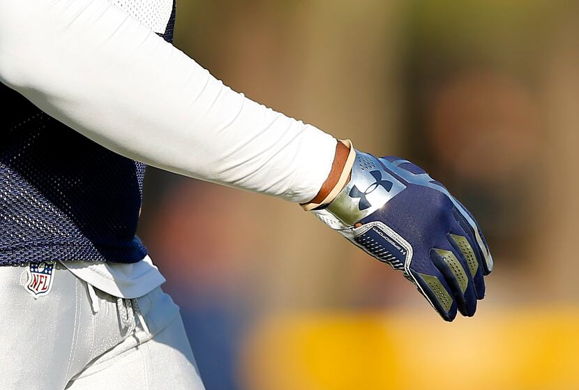 Dallas Cowboys cornerback Brandon Carr (39) wears a rubber band on his right wrist during...