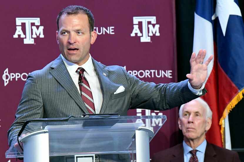 Texas A&M athletic director Ross Bjork, left, addresses media and A&M athletic staff in the...