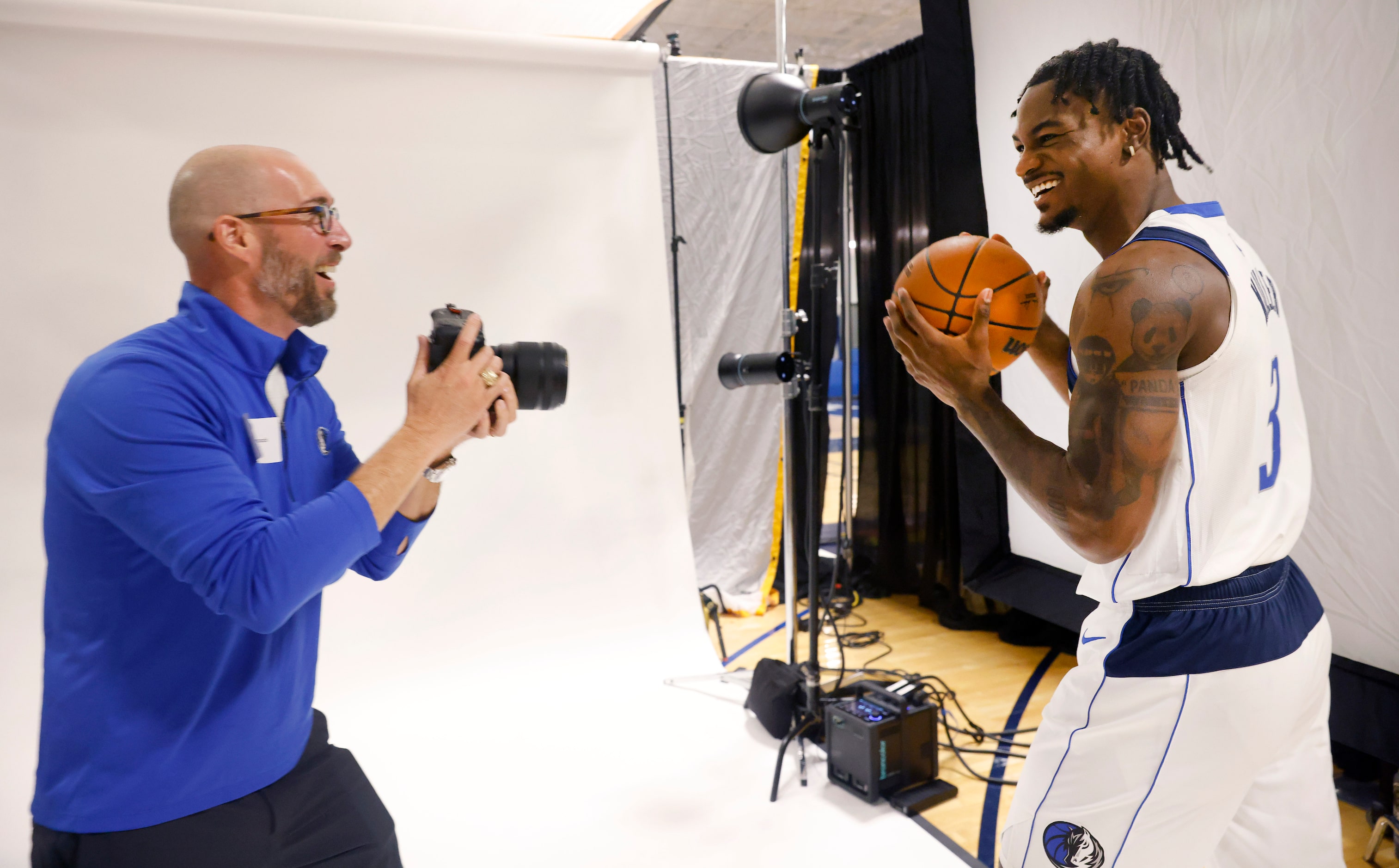 Dallas Mavericks rookie forward Emanuel Miller (right) poses for photographer Andrew Hancock...