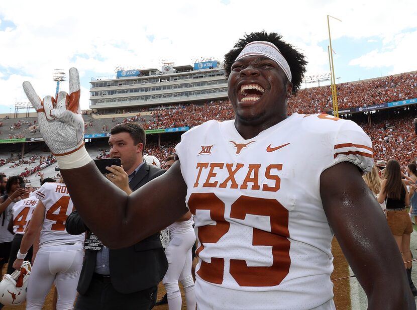 DALLAS, TX - OCTOBER 06:  Jeffrey McCulloch #23 of the Texas Longhorns celebrates a win...