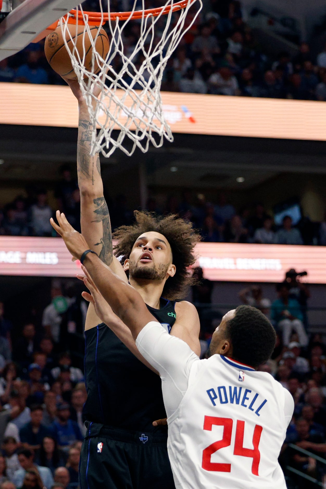 Dallas Mavericks center Dereck Lively II (2) shoots over LA Clippers guard Norman Powell...