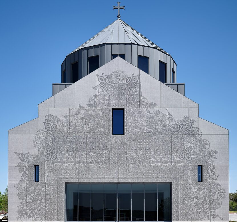 Viewed from a distance, the 1.5 million glyphs or "pixels" on the church's facade coalesce...