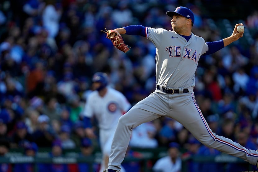 Texas Rangers relief pitcher Brock Burke throws during the sixth inning of a baseball game...