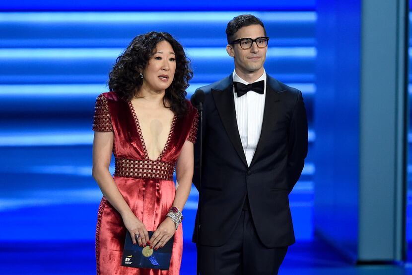 Actress Sandra Oh and comedian-actor Andy Samberg will share Golden Globes hosting duties...