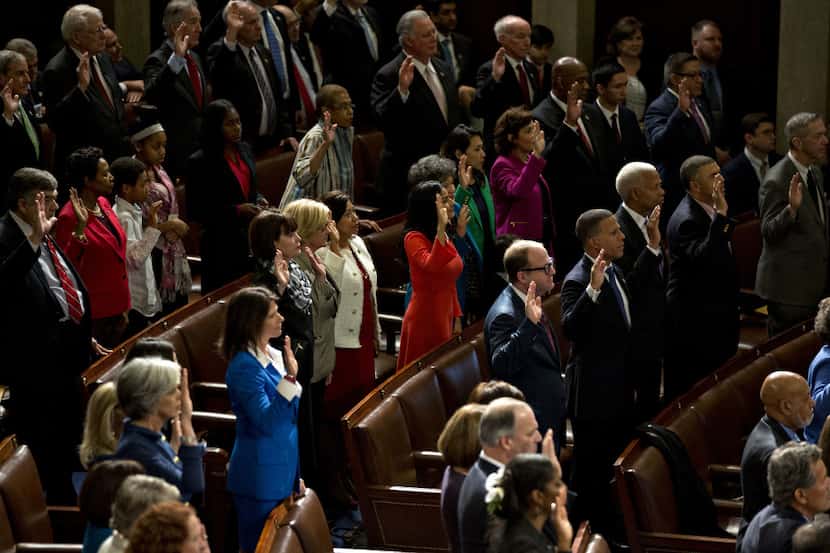 Democratic House lawmakers are sworn-in en masse by U.S. House Speaker Paul Ryan, a...