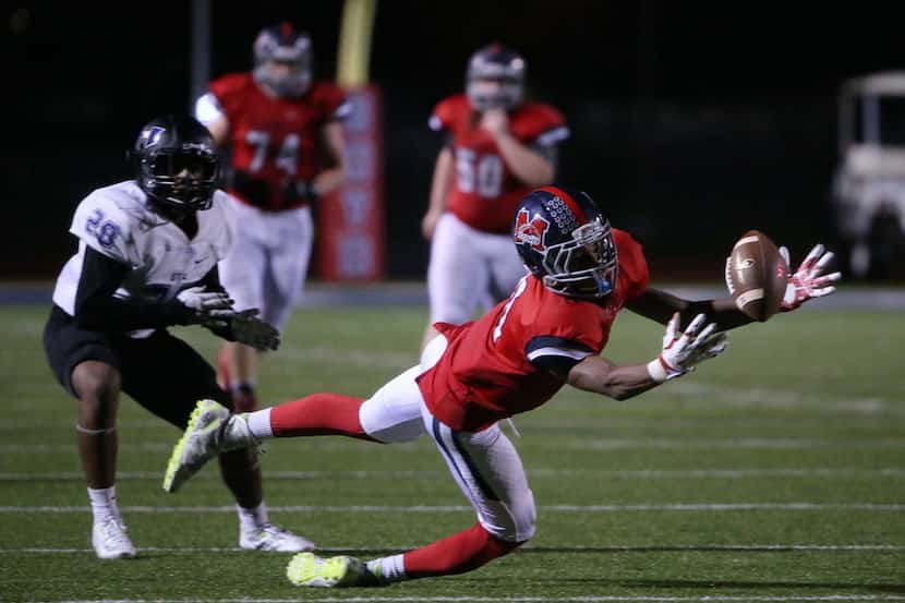McKinney Boyd wide receiver Julian Coaxum is unable to make a reception on a fourth down and...