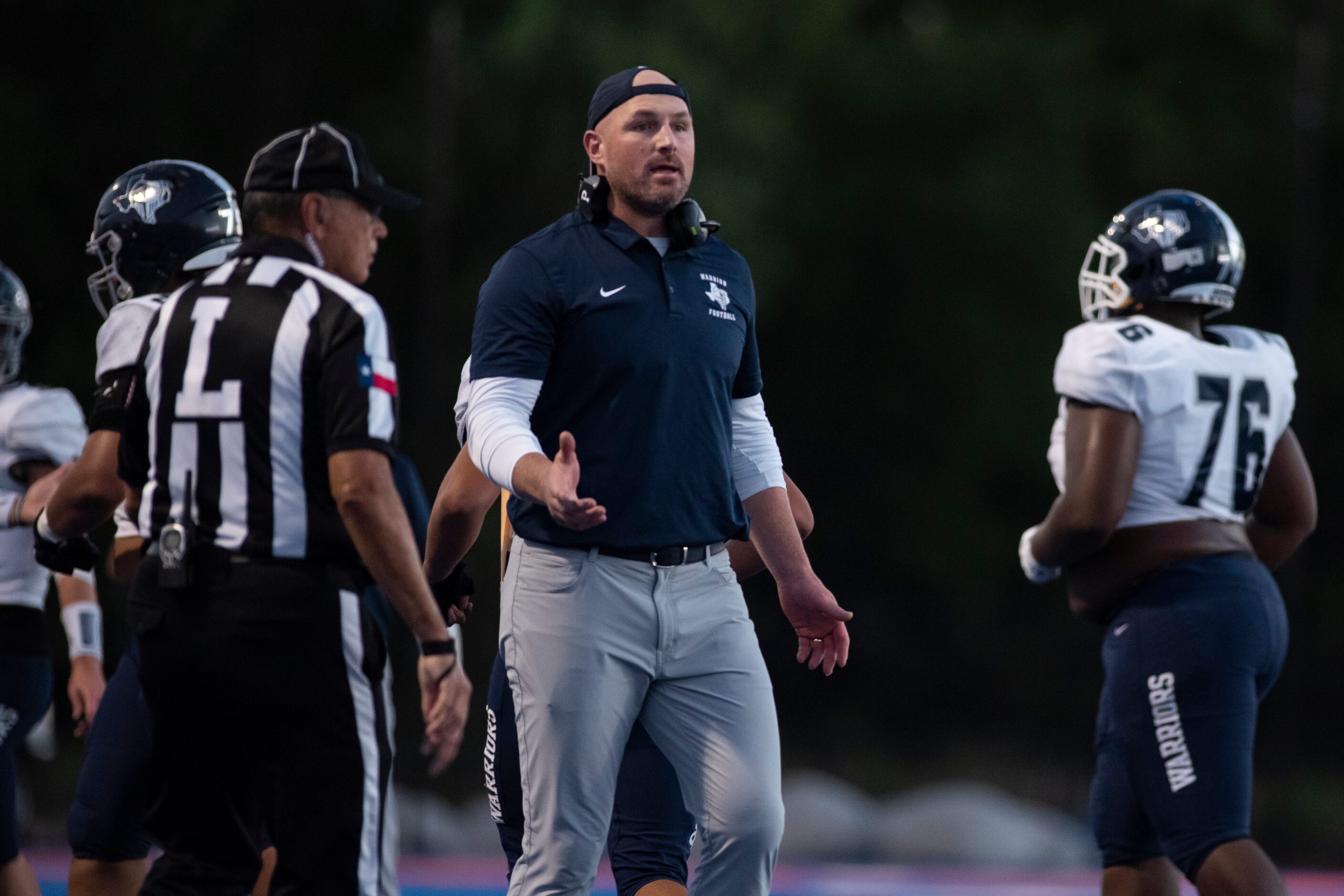 Argyle Liberty Christian Head Coach Jason Witten talks to a referee about a missed call...