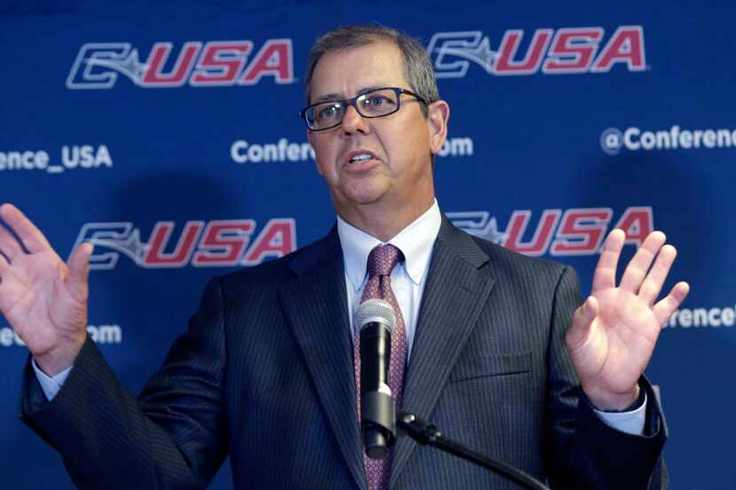 FILE - In this July 23, 2014, file photo, Conference USA commissioner Britton Banowsky...