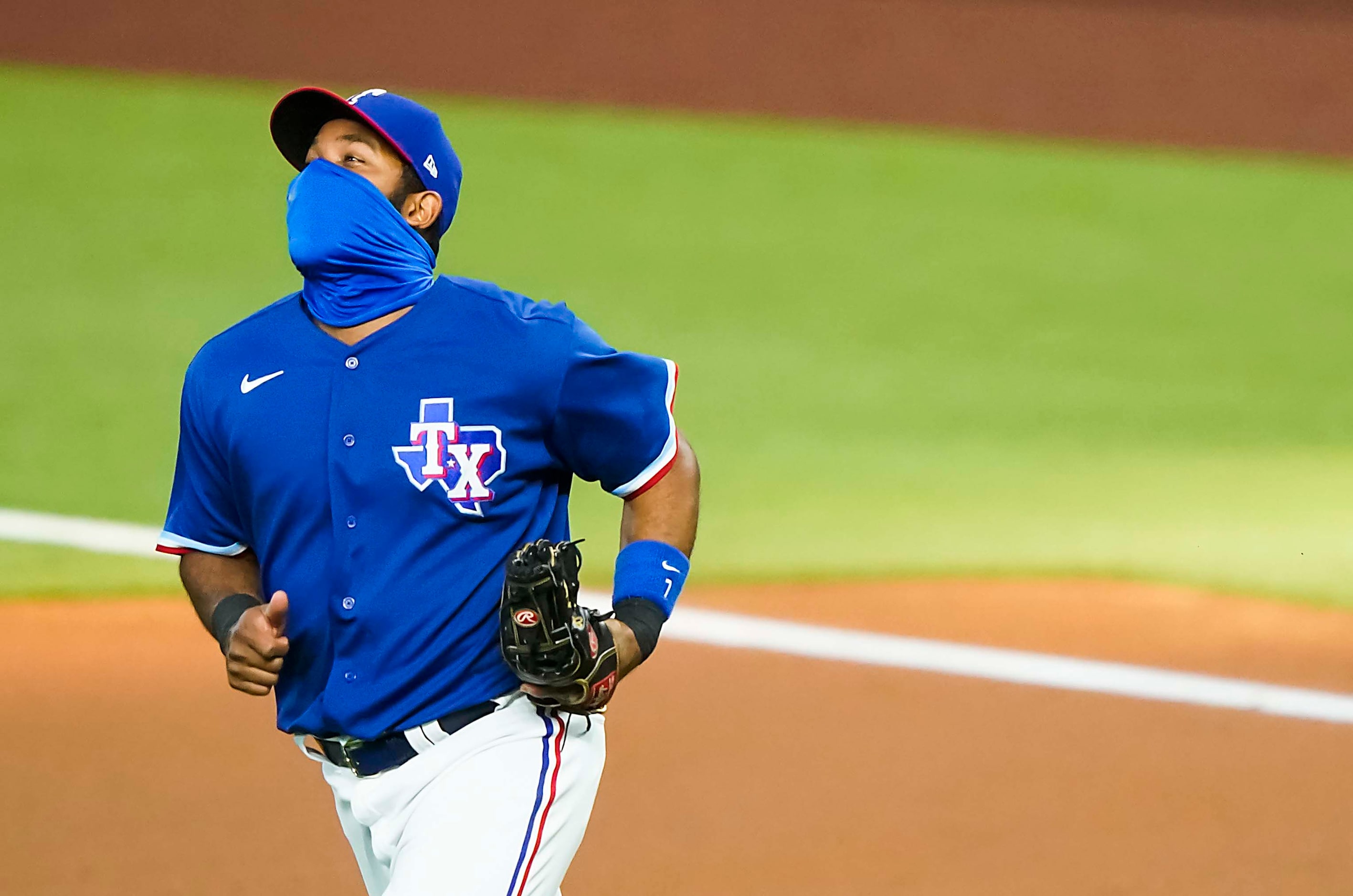 Texas Rangers shortstop Elvis Andrus takes the field for an exhibition game against the...