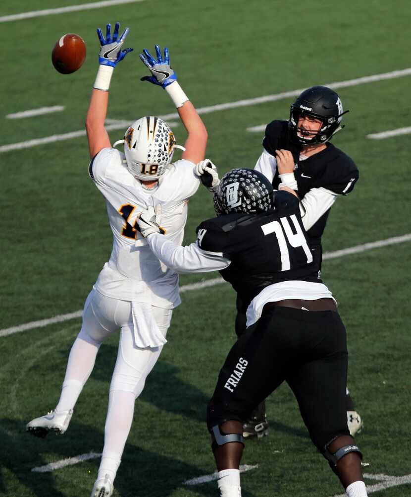 Plano Prestonwood defender Austin Stogner (18) tips a pass by Bishop Lynch, as Bishop Lynch...