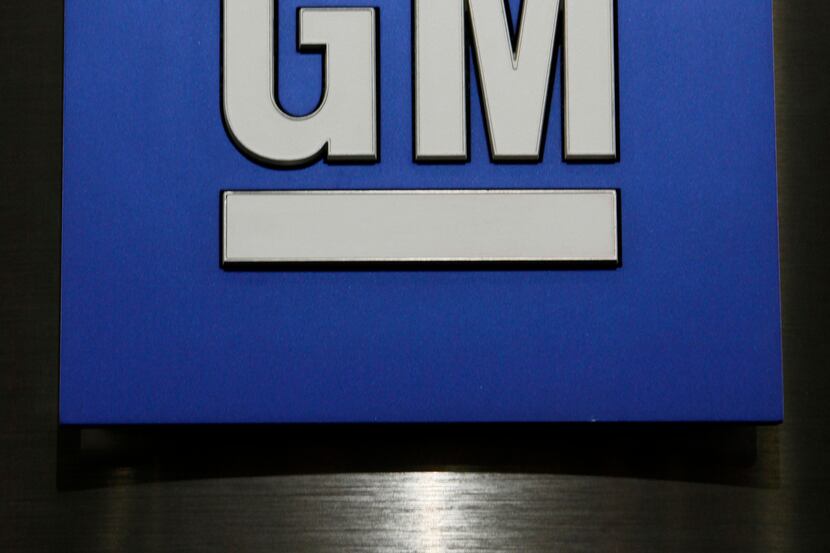 FILE - In this Jan. 25, 2010, file photo, a General Motors Co. logo is shown during a news...