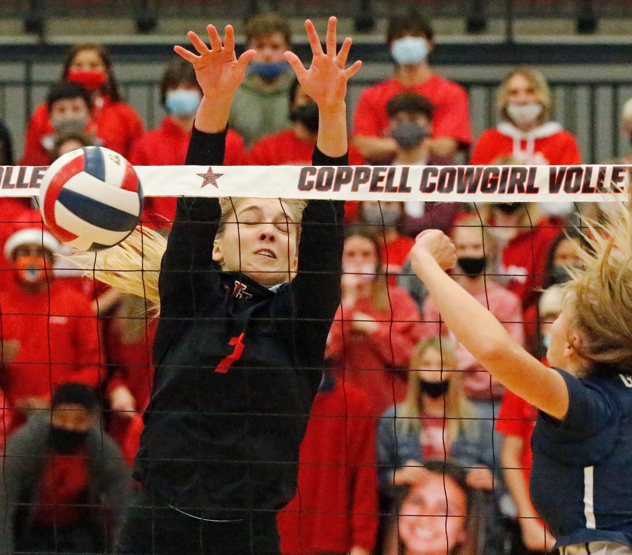 Lovejoy High School outside hitter Ellie Jonke (7) gets a block during game one as Grapevine...