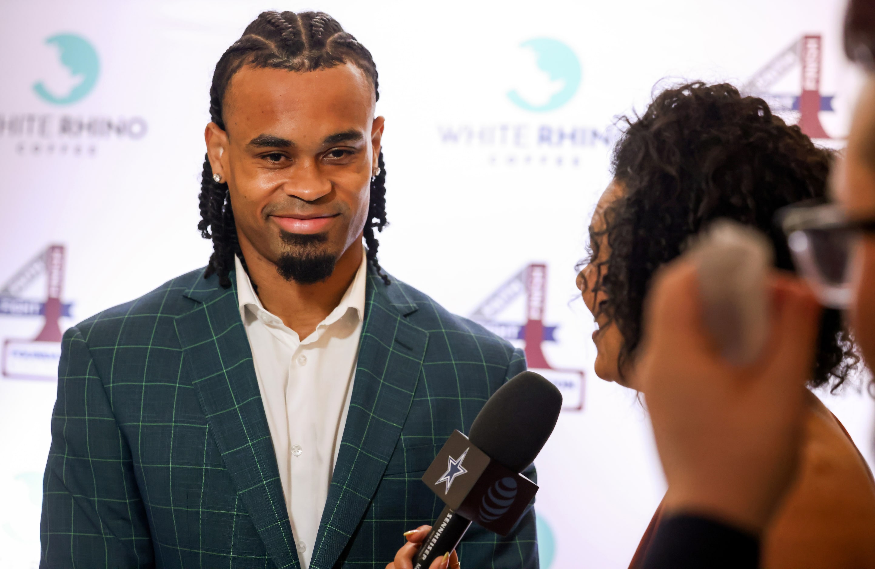 Dallas Cowboys wide receiver Jalen Tolbert (left) answers media questions at the annual...