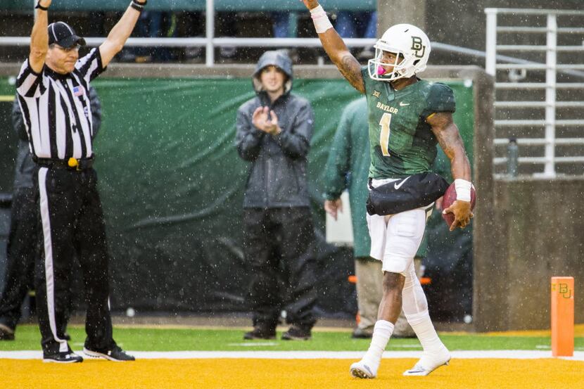 Baylor Bears wide receiver Corey Coleman (1) celebrates after scoring a touchdown during the...